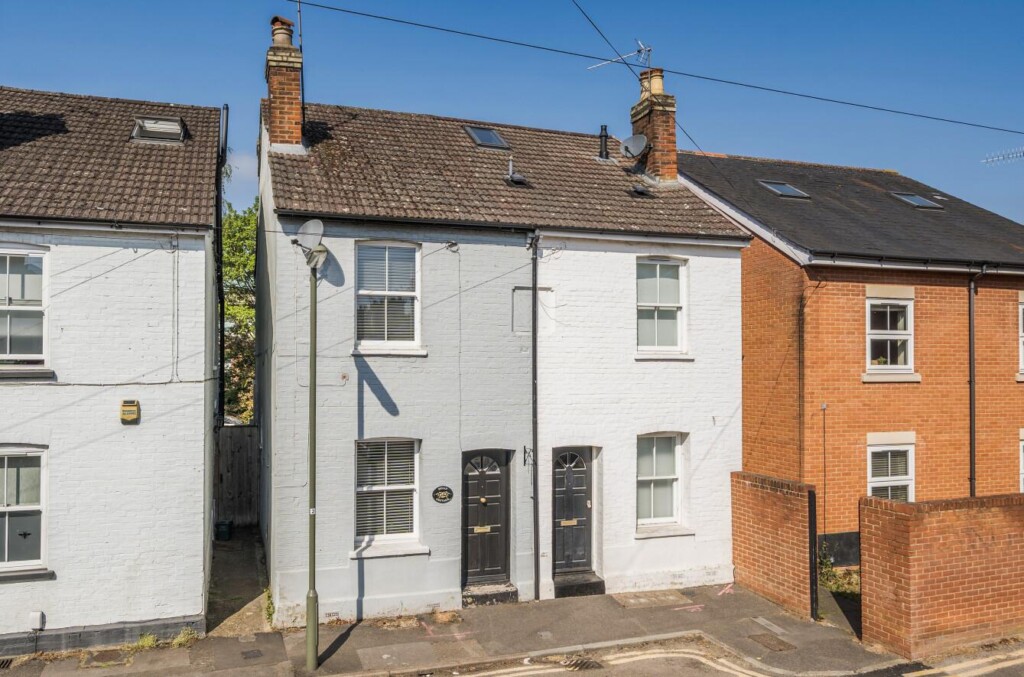 Traditional White Terraced Houses On Residential Street In Guildford
